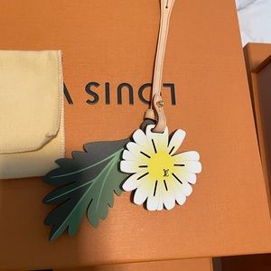 Louis Vuitton bag charm, never used.